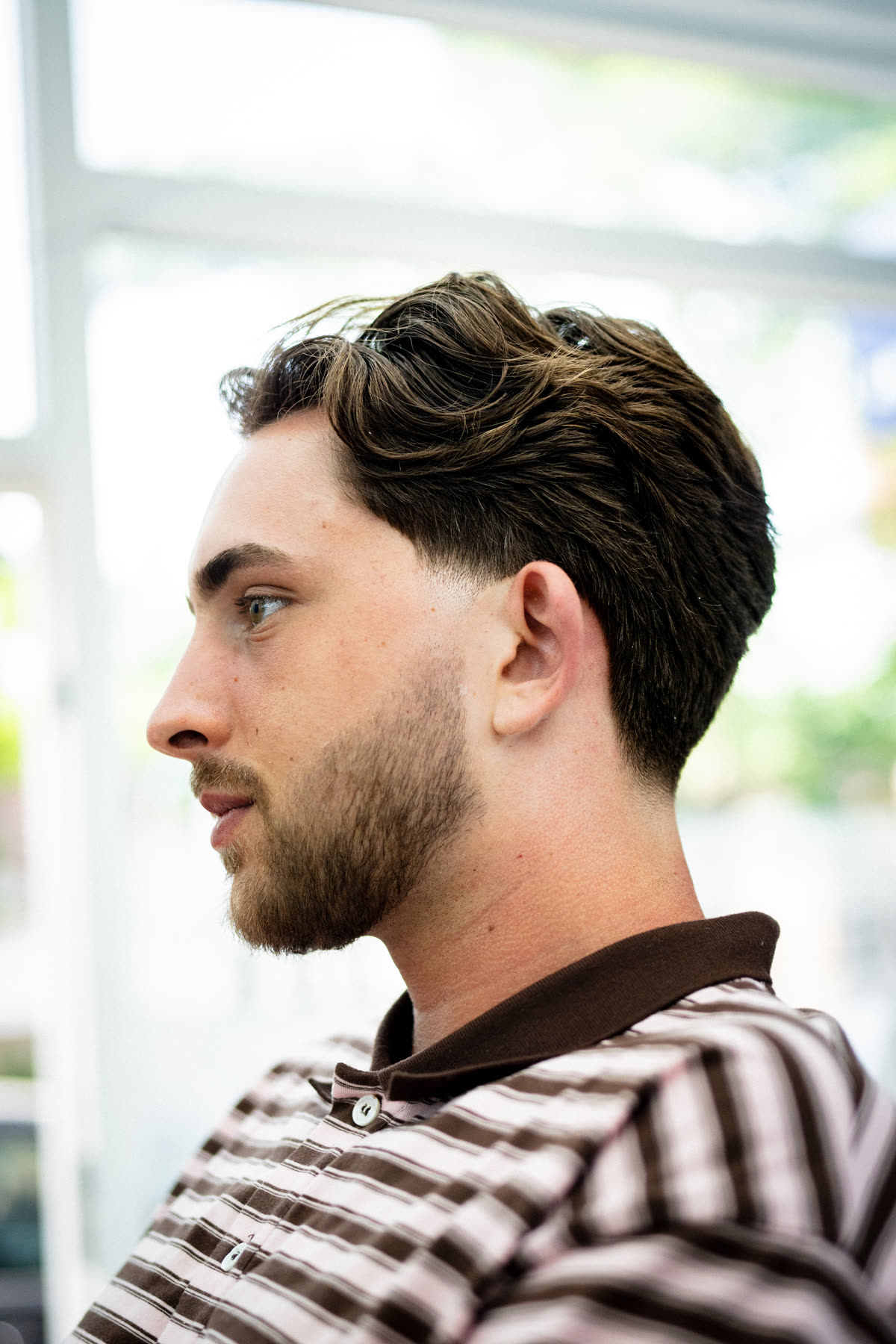 Portræt med fokus på klipning og styling for Unique Style